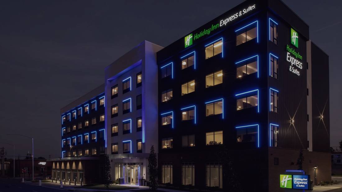 Holiday Inn Express & Suites in Little Rock, Arkansas, lit at night.
